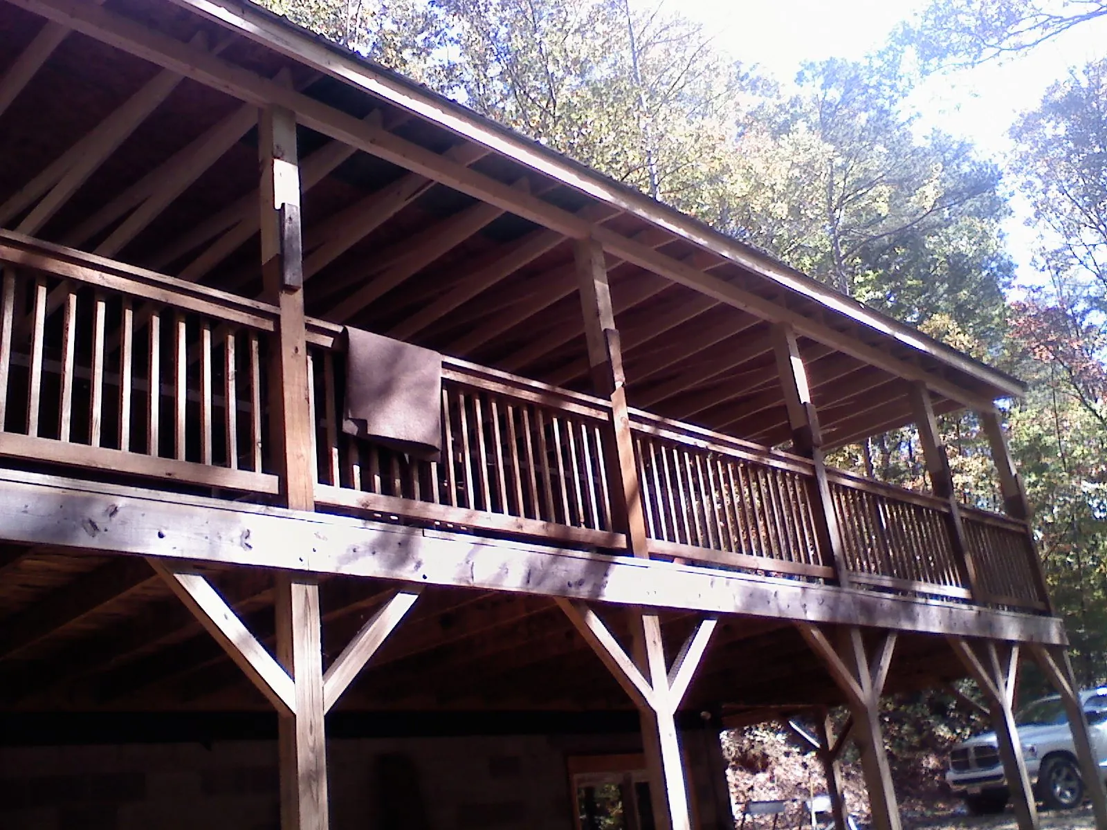 Timber framing under a new elevated porch and deck — Roof Leak Repair in Paris by Roofing Brothers